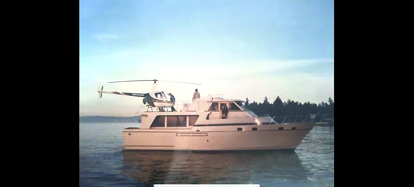 Vintage photo of a yacht with a helicopter on deck